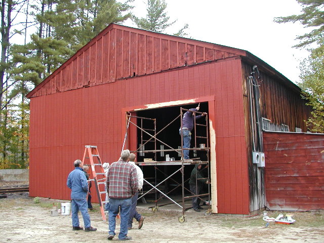 Painting the new doorway and front of the Fernald Engine House.